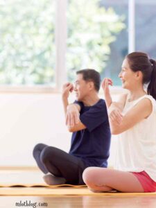 Candlelit-Couples-Yoga-valentine's-day-games-for-adults